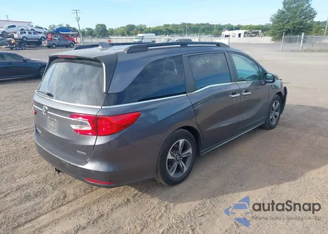 2020 Honda Odyssey Touring z USA, uszkodzony, nr VIN 5FNRL6H83LB033947